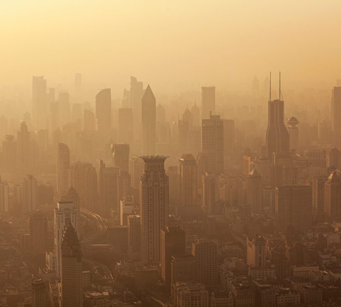Air pollution seen over Shanghai's Puxi District buildings at dusk, China