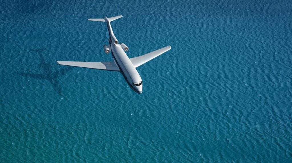 Airplane flying over the ocean. Food allergy reaction on plane.